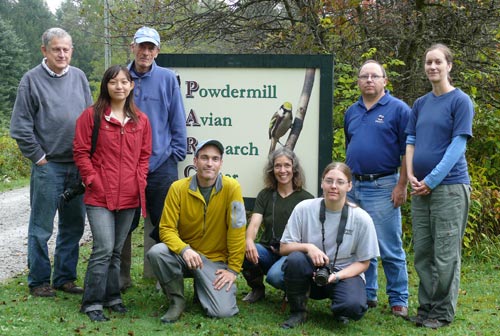 group of people in front of PNR sign